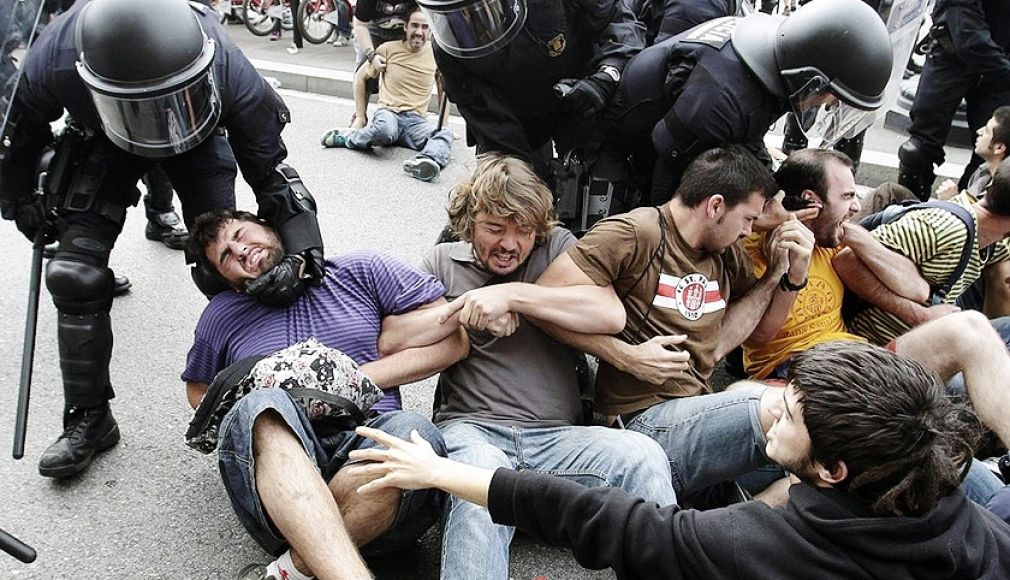 Riot police have clashed with protesters in Spain, Italy and Portugal